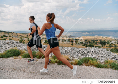 Mountain Bliss: Capturing the Joy of Morning Trail Running Mountain Bliss: Capturing the Joy of Morning Trail Running 126399964