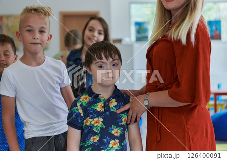 Preschool children wait in line for new and interesting games. Selective focus Preschool children wait in line for new and interesting games. Selective focus 126400091