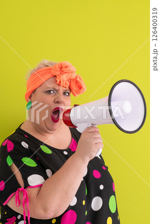 Colorful Retro Woman Shouting Through a Megaphone Colorful Retro Woman Shouting Through a Megaphone 126400319