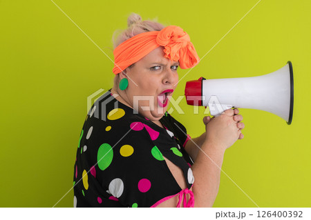 Colorful Retro Woman Shouting Through a Megaphone Colorful Retro Woman Shouting Through a Megaphone 126400392
