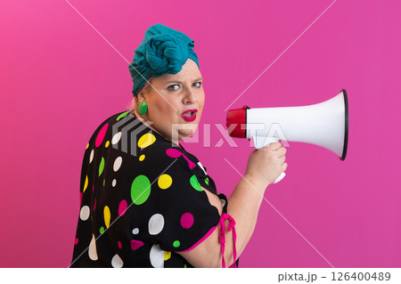 Colorful Retro Woman Shouting Through a Megaphone 126400489