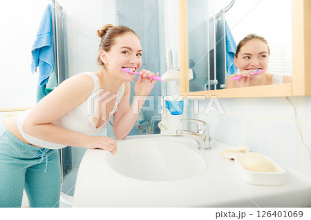 Woman brushing cleaning teeth. Oral hygiene. Woman brushing cleaning teeth. Oral hygiene. 126401069