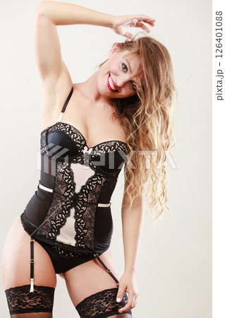 Smiling girl wearing sexy lingerie Smiling girl wearing sexy lingerie 126401088