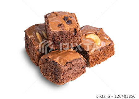 Pile of delicious homemade chocolate brownies isolated on white background. Pile of delicious homemade chocolate brownies isolated on white background. 126403850