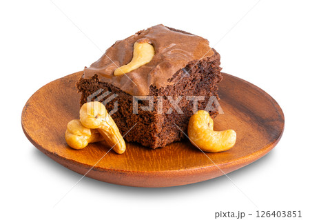 Homemade chocolate brownie with cashew nut in wooden plate. 126403851