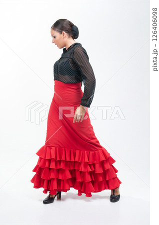 Spanish flamenco dancer in traditional dress isolated on white background for the Fair Spanish flamenco dancer in traditional dress isolated on white background for the Fair 126406098