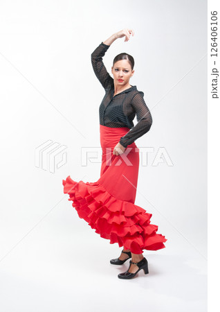 Spanish flamenco dancer in traditional dress isolated on white background for the Fair Spanish flamenco dancer in traditional dress isolated on white background for the Fair 126406106