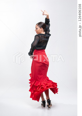 Spanish flamenco dancer in traditional dress isolated on white background for the Fair	 126406108
