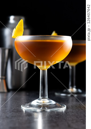 Paper plane cocktail on black slate background 126407642