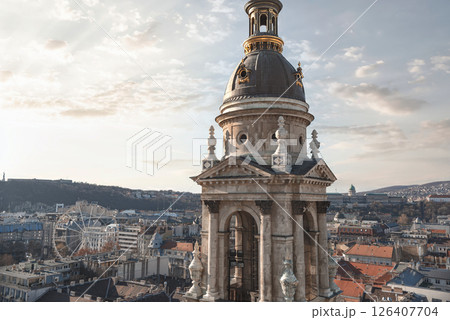 Saint Stephen Basilica tower rising above Budapest cityscape on a sunny day Saint Stephen Basilica tower rising above Budapest cityscape on a sunny day 126407704