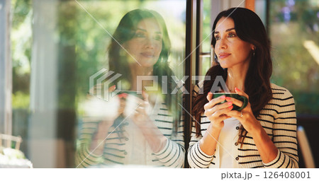 Mature woman, tea cup and thinking by window for nostalgia, memory and insight in home. Modern house, coffee and person drinking beverage to relax on break in living room to remember with reflection Mature woman, tea cup and thinking by window for nostalgia, memory and insight in home. Modern house, coffee and person drinking beverage to relax on break in living room to remember with reflection 126408001