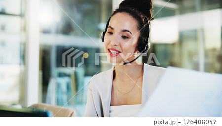 Headset, laptop and businesswoman with document in online meeting for customer service, guidance or video call. Office, financial advisor and webinar for portfolio management, account advice and help 126408057