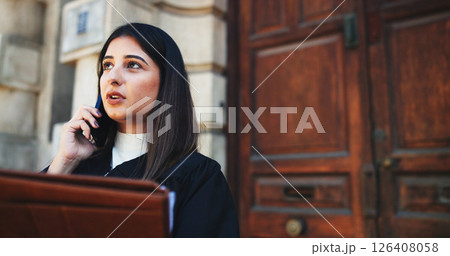 Phone call, lawyer and woman in city, conversation and documents with legal aid service. Outdoor, employee and attorney with smartphone, discussion and folder for court case, talking and negotiation Phone call, lawyer and woman in city, conversation and documents with legal aid service. Outdoor, employee and attorney with smartphone, discussion and folder for court case, talking and negotiation 126408058