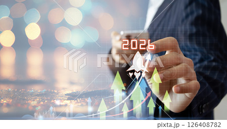 Happy New Year 2026 Businessman and rocket soars to 2026 to start and welcome the upcoming new year. 126408782
