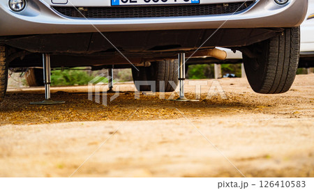 Caravan leveling support leg in use. Caravan leveling support leg in use. 126410583