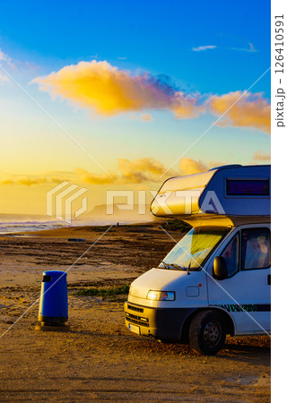Camper rv on beach seashore Camper rv on beach seashore 126410591
