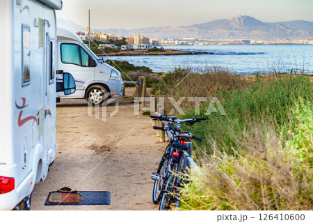 Caravan camping on mediterranean coast. 126410600
