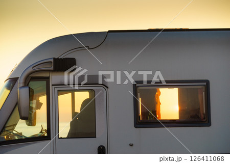 Caravan on coast at sunset 126411068