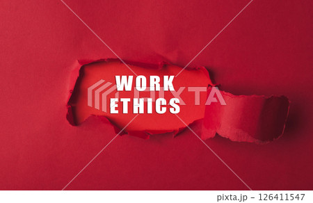 Red background with the word work ethics written in white 126411547