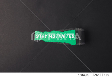 A green sign that says Stay Motivated A green sign that says Stay Motivated 126411579