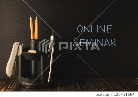 Black desk with a pencil holder 126411664