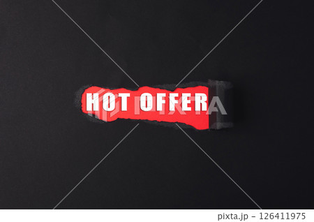 Red and black sign that says hot offer is cut out of a black background Red and black sign that says hot offer is cut out of a black background 126411975