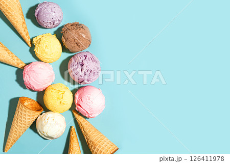 Ice cream scoops and waffle cones creative flat lay 126411978