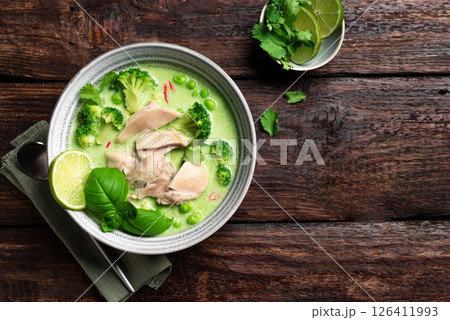 Bowl of thai green curry chicken soup 126411993