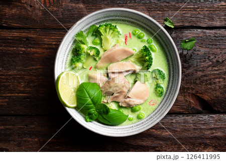 Bowl of thai green curry chicken soup 126411995