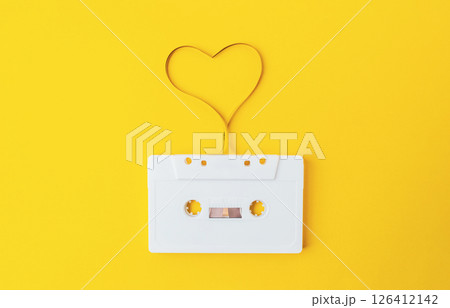 White cassette tape with a heart drawn on it 126412142
