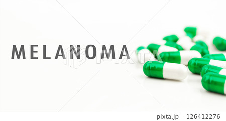 A bunch of pills with the word Melanoma written on them A bunch of pills with the word Melanoma written on them 126412276