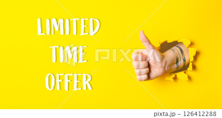Hand giving a thumbs up with the words limited time offer written below it 126412288