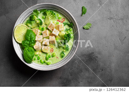 Thai green curry vegan soup with tofu Thai green curry vegan soup with tofu 126412362