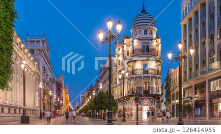 Illuminated Adriatica building on Avenida de la Constitucion at night, Seville, Spain Illuminated Adriatica building on Avenida de la Constitucion at night, Seville, Spain 126414985