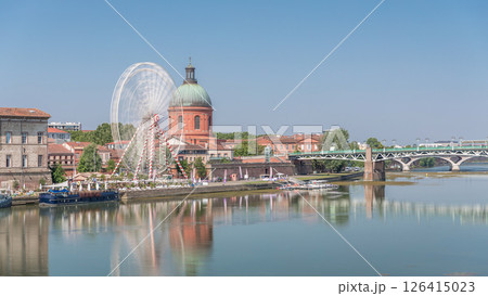 Aerial view of the Garonne River to La Grave Hospital's green dome timelapse hyperlapse. Toulouse, France Aerial view of the Garonne River to La Grave Hospital's green dome timelapse hyperlapse. Toulouse, France 126415023