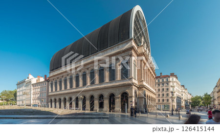 Hyperlapse of Lyon's opera house featuring neoclassical architecture combined with a modern glass dome roof. France 126415144
