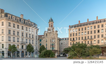 Hyperlapse of Place Antonin Jutard and the Mutuality Palace facade from the waterfront near Guillotiere Bridge in Lyon, France. 126415145