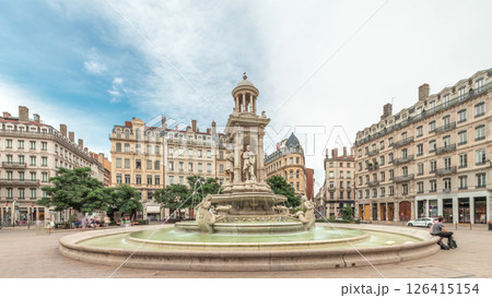 Hyperlapse of Place des Jacobins in Lyon, France, featuring the ornate Fontaine des Jacobins surrounded by historic buildings. Hyperlapse of Place des Jacobins in Lyon, France, featuring the ornate Fontaine des Jacobins surrounded by historic buildings. 126415154