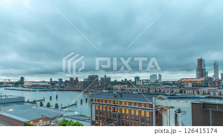 Aerial panoramic view over Maashaven day to night timelapse in Rotterdam. Aerial panoramic view over Maashaven day to night timelapse in Rotterdam. 126415174