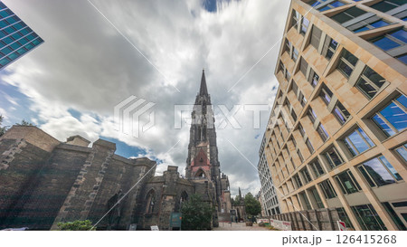 Looking up perspective to the facade of Ehemalige Hauptkirche St. Nikolai timelapse hyperlapse in Hamburg, Germany 126415268