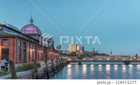 Hyperlapse of Altona Fish Market in Hamburg transition from day to night. Germany Hyperlapse of Altona Fish Market in Hamburg transition from day to night. Germany 126415277