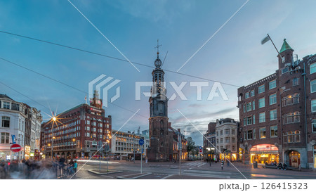 Munttoren tower and flowers market. Panoramic day to night timelapse hyperlapse of Amsterdam city center. Netherlands Munttoren tower and flowers market. Panoramic day to night timelapse hyperlapse of Amsterdam city center. Netherlands 126415323