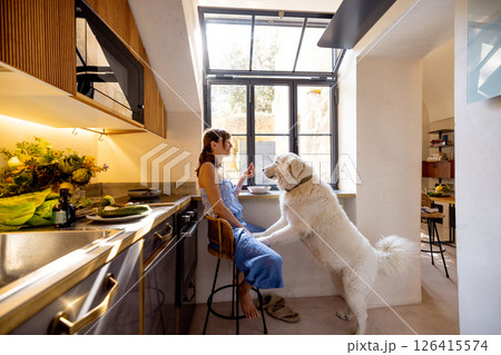 Morning Snack with a Furry Friend 126415574