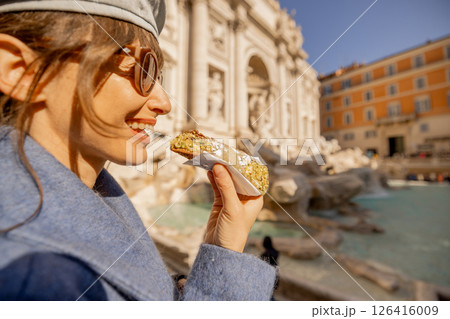 Smiling with a Cannolo by Trevi Fountain 126416009
