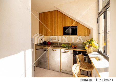 Sunny Kitchen with Natural Decor 126416024
