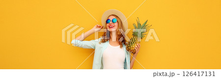 Summer vacation, happy joyful young woman with pineapple fruit, cheerful girl on yellow background Summer vacation, happy joyful young woman with pineapple fruit, cheerful girl on yellow background 126417131