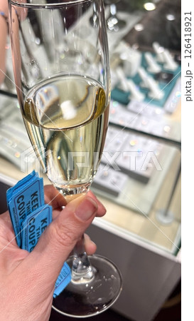 Celebratory Toast with Sparkling Wine and Raffle Tickets at a Special Event, Party Time 126418921