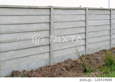 Construction activity of a concrete fence urban setting clear environment wide angle infrastructure Construction activity of a concrete fence urban setting clear environment wide angle infrastructure 126419686