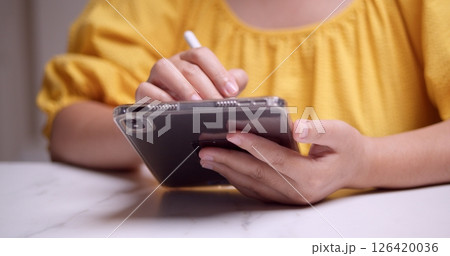 Creative digital note-taking action home office indoor close-up productivity 126420036