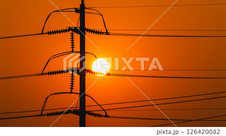 Sunset over power lines urban landscape evening wide angle energy vision 126420082